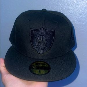 This is a never worn brand new All black Raiders hat Size 8